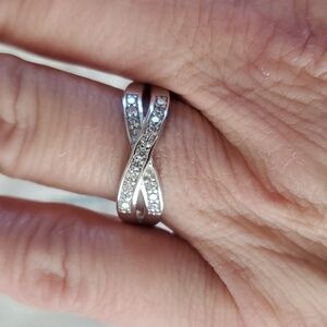 Sterling silver ring with cross round stone front